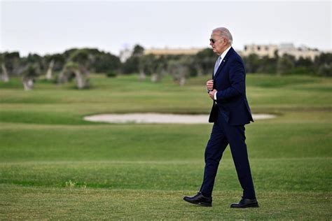 biden looking at watch fake|Biden G7 video: conservative media uses misleading camera angle .